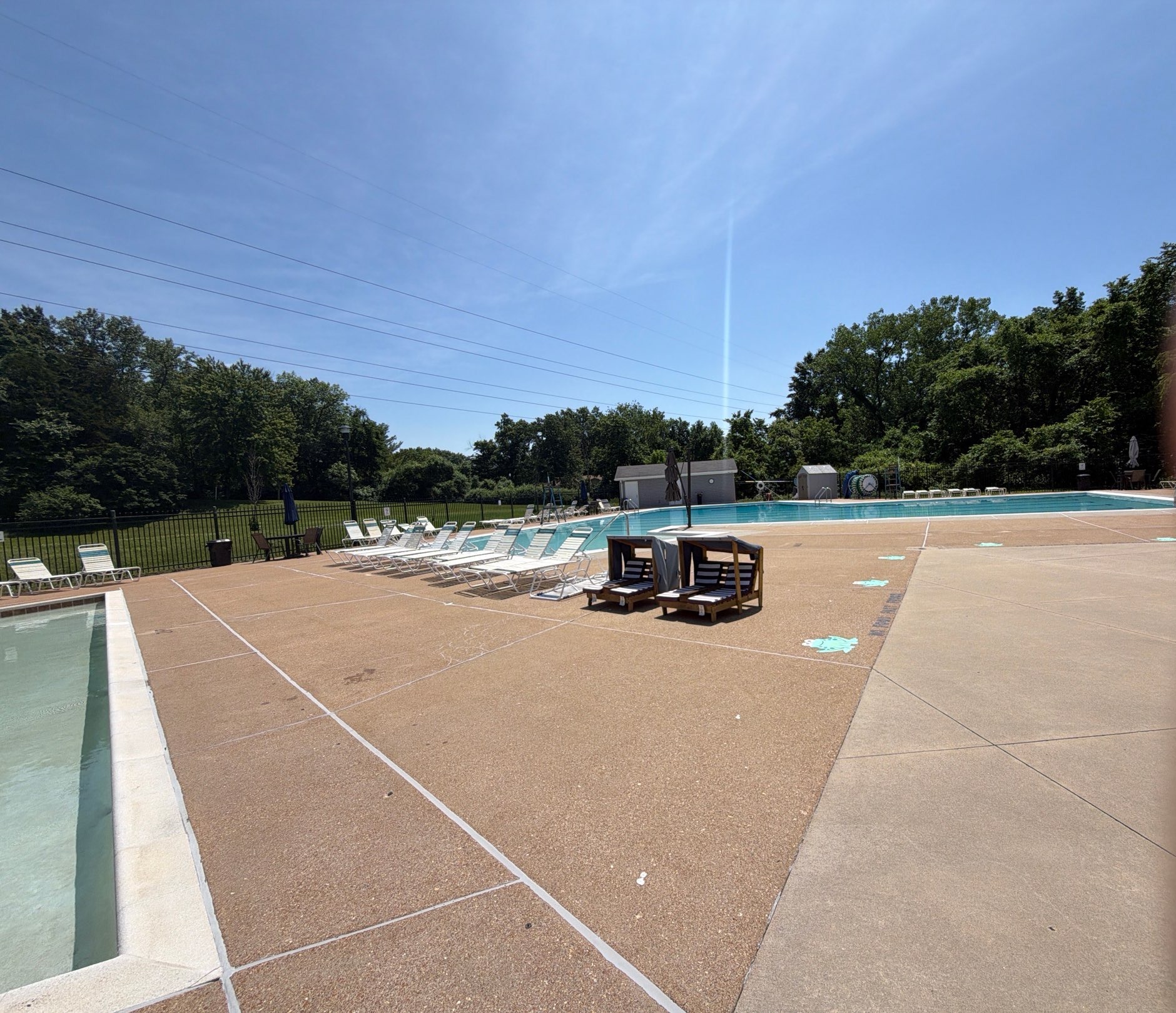 Community pool deck and concrete after pressure washing